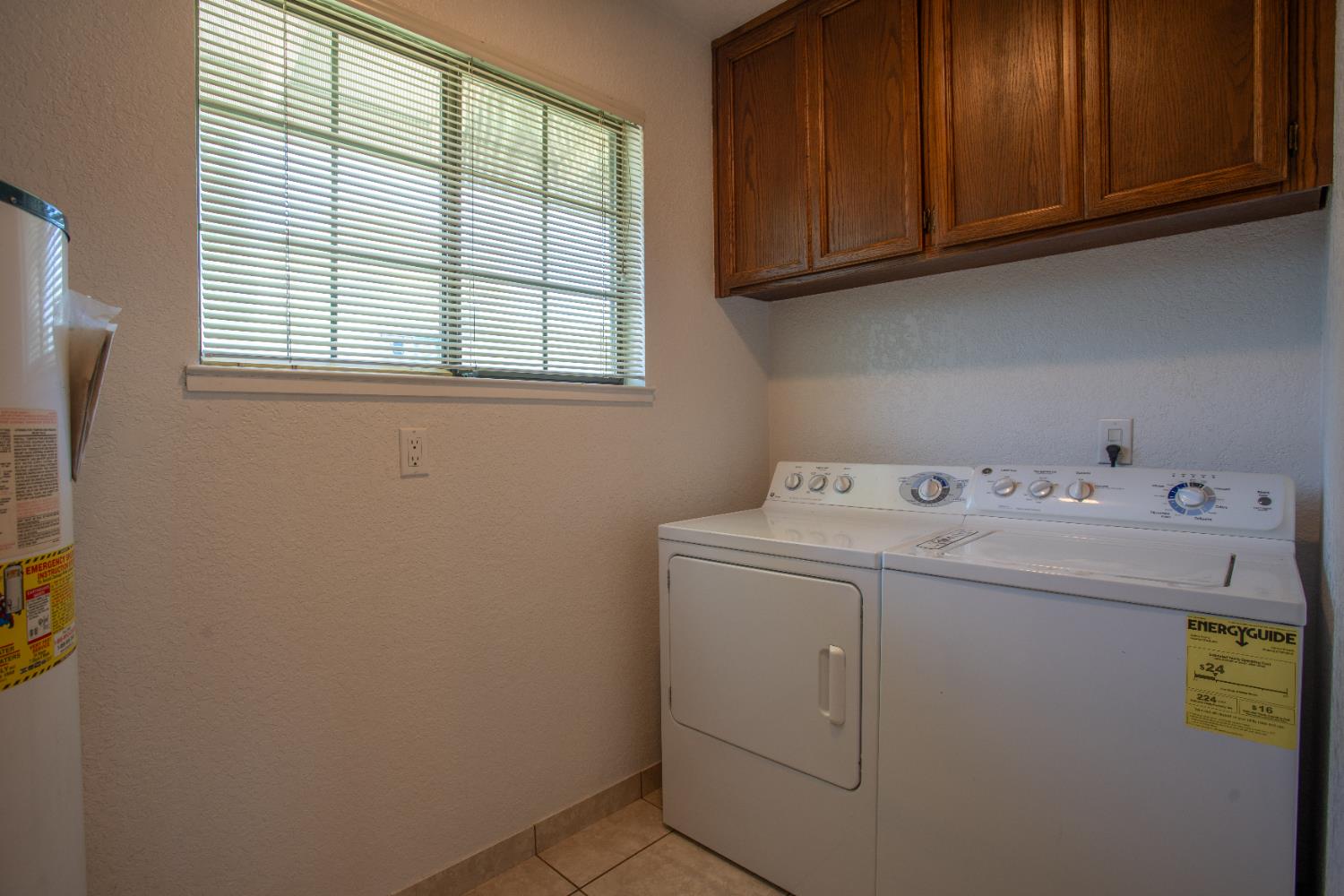 6323 Excelsior Road Sacramento, CA 95830 - Photo 39 of 75 a utility room with dryer and washer