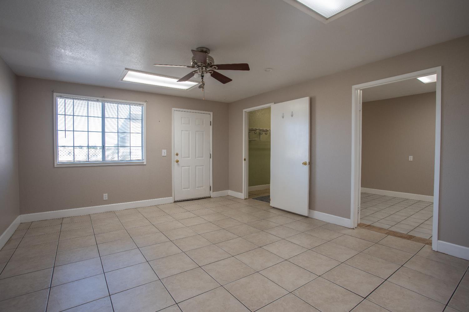 6323 Excelsior Road Sacramento, CA 95830 - Photo 53 of 75 a view of an empty room with a window