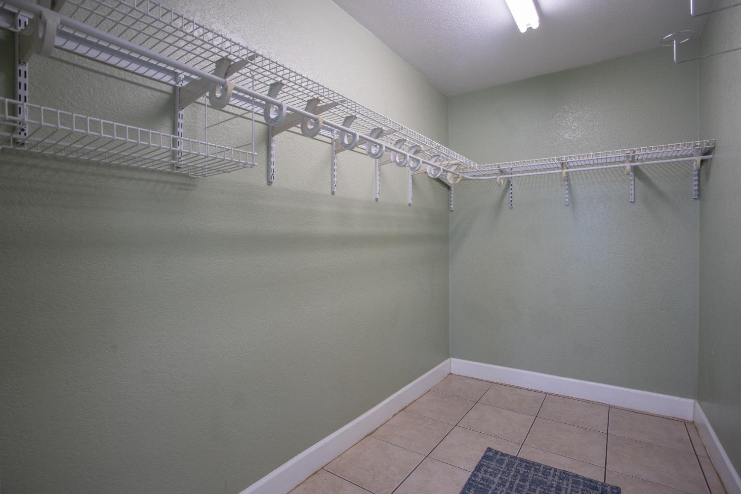 6323 Excelsior Road Sacramento, CA 95830 - Photo 56 of 75 a view of a room with racks on the wall