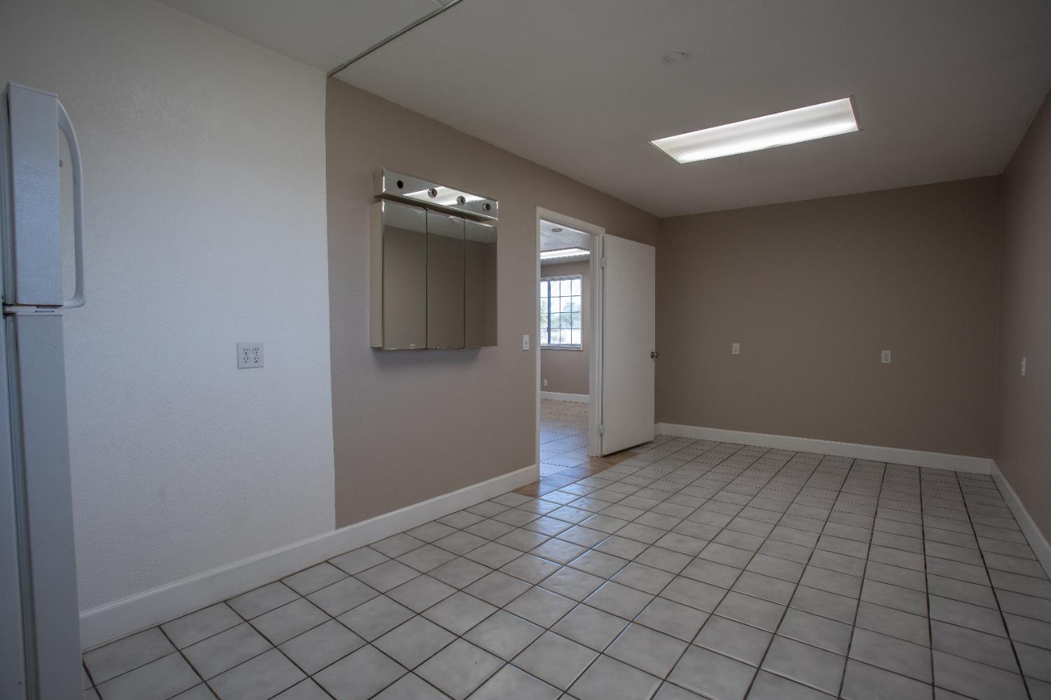 6323 Excelsior Road Sacramento, CA 95830 - Photo 58 of 75 a view of an empty room and window