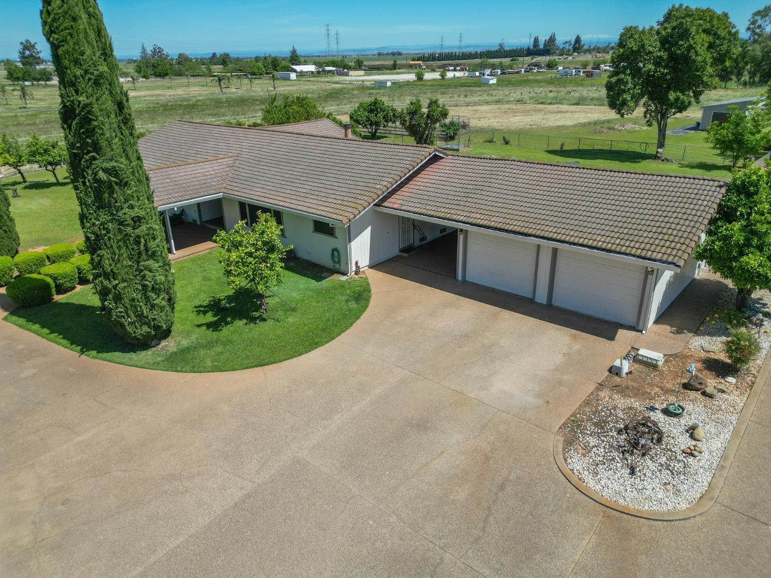 6323 Excelsior Road Sacramento, CA 95830 - Photo 6 of 75 an aerial view of a house with a yard and lake view