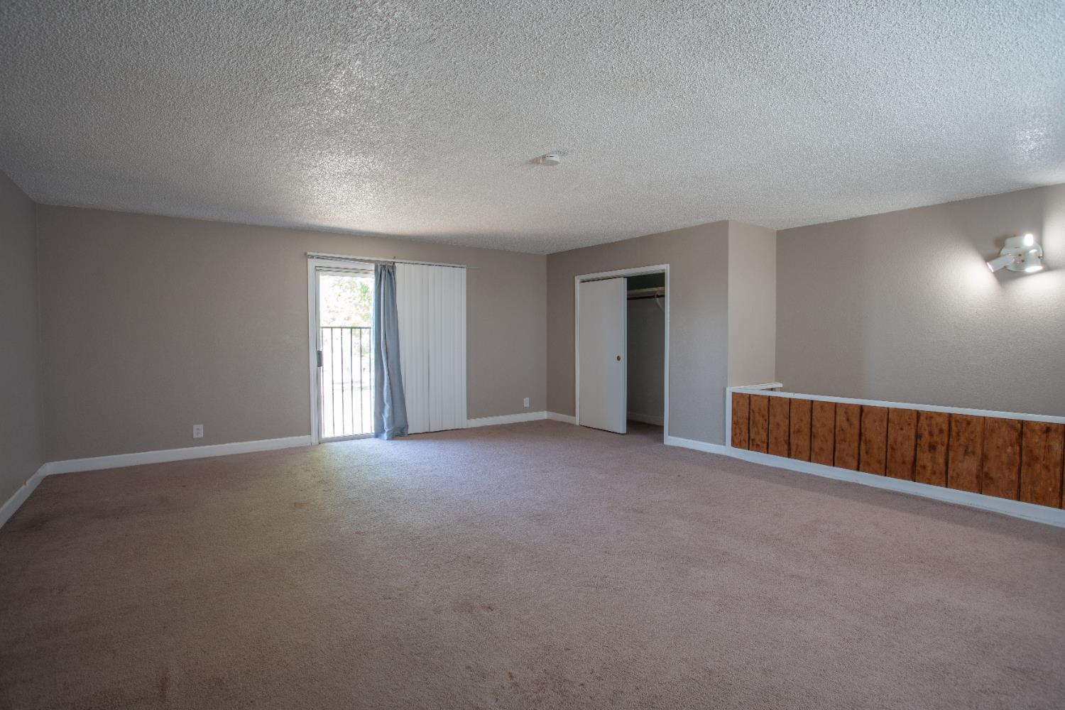 6323 Excelsior Road Sacramento, CA 95830 - Photo 64 of 75 a view of an empty room with a window