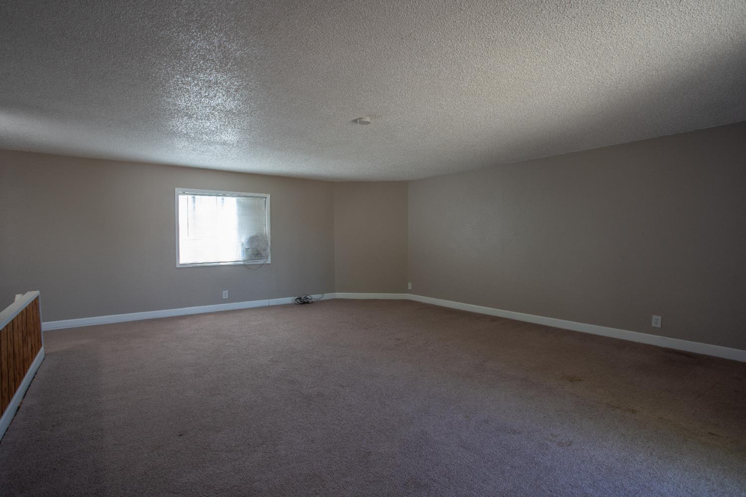6323 Excelsior Road Sacramento, CA 95830 - Photo 66 of 75 a view of an empty room and a window