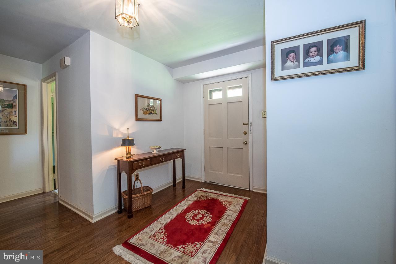 247 Church Road Devon, PA 19333 - Photo 2 of 35 a view of room with window and wooden floor