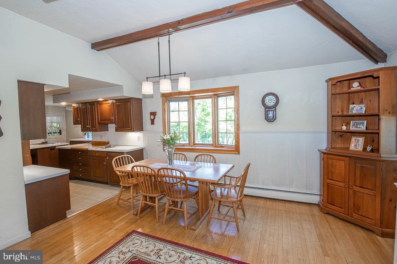 247 Church Road Devon, PA 19333 - Photo 12 of 35 a view of a dining room with furniture window and wooden floor