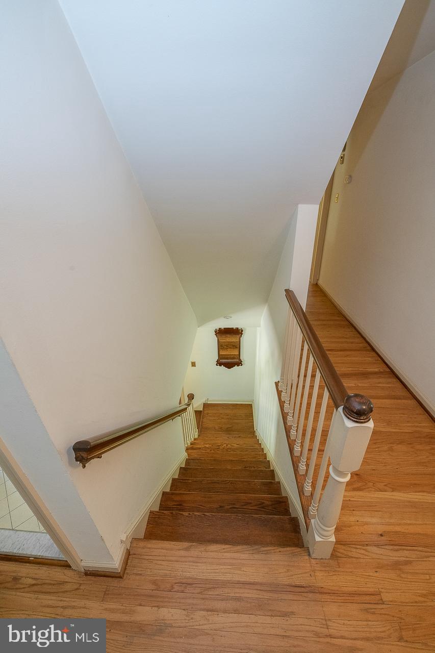 247 Church Road Devon, PA 19333 - Photo 19 of 35 a view of entryway and hall with wooden floor