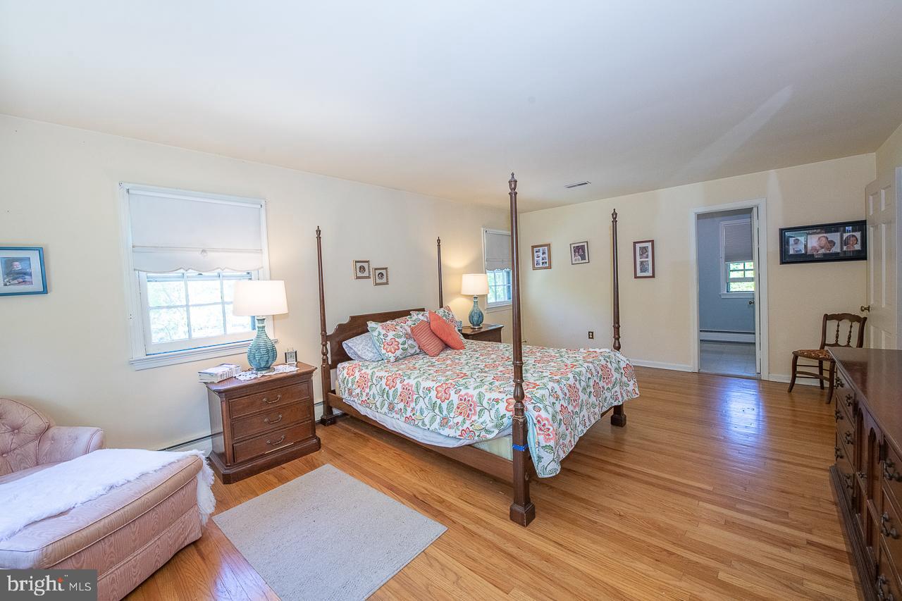 247 Church Road Devon, PA 19333 - Photo 22 of 35 a bedroom with a bed and a window