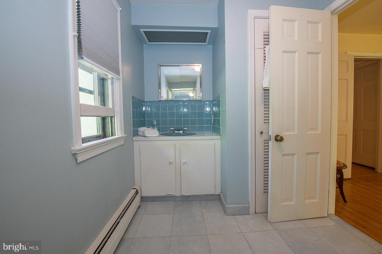 247 Church Road Devon, PA 19333 - Photo 23 of 35 a view of an entryway with wooden floor
