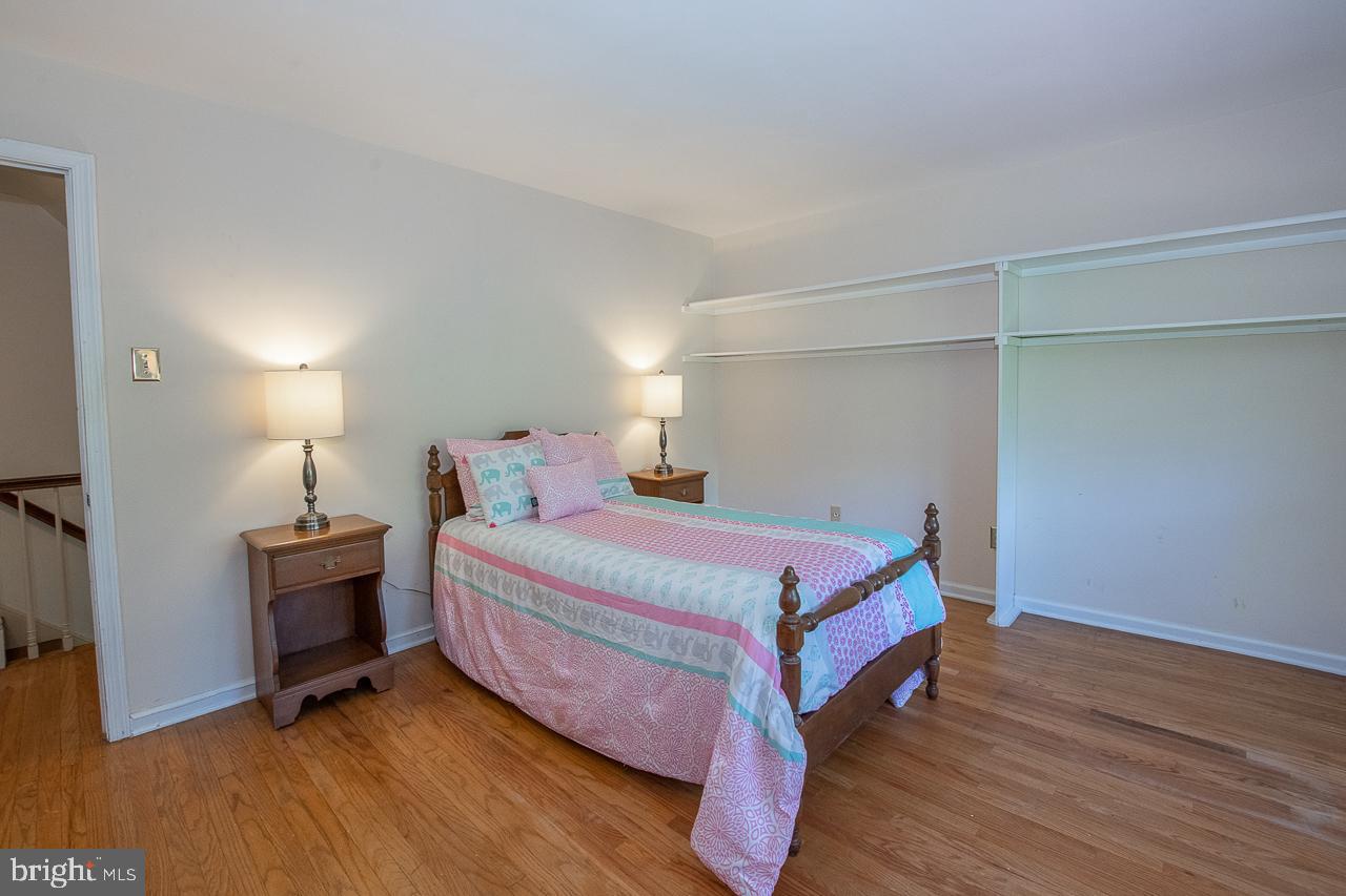 247 Church Road Devon, PA 19333 - Photo 24 of 35 a bedroom with a bed and a desk