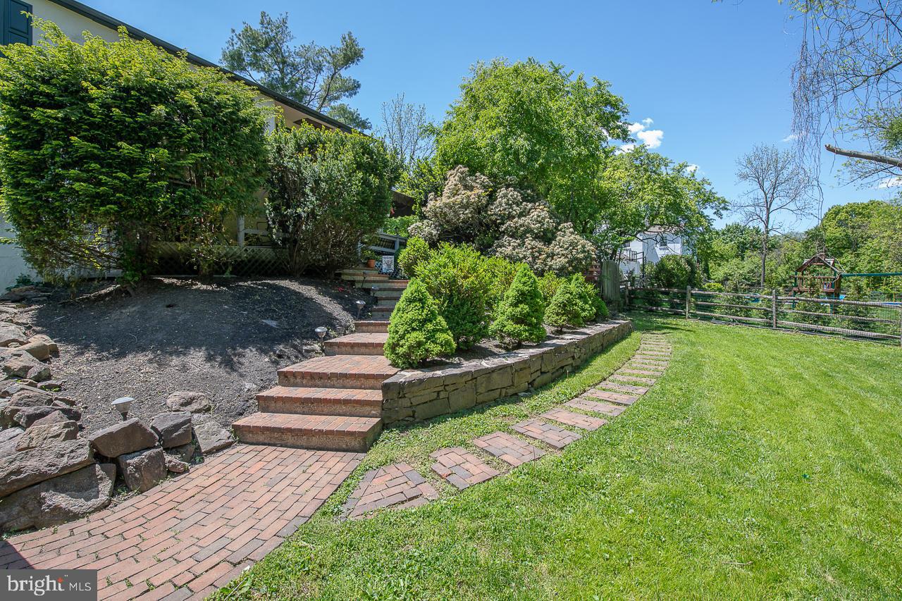 247 Church Road Devon, PA 19333 - Photo 29 of 35 a view of a garden with pathway