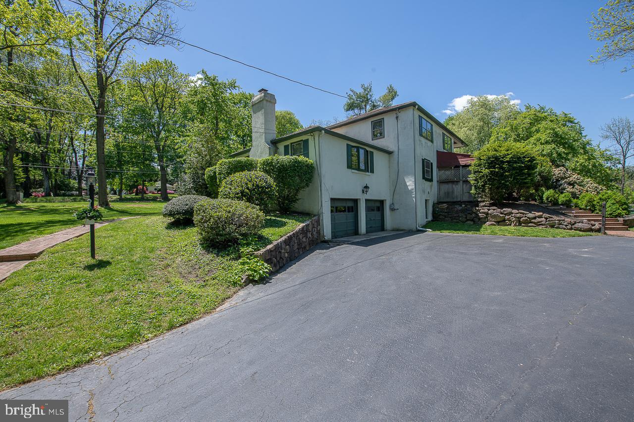 247 Church Road Devon, PA 19333 - Photo 34 of 35 a view of a house with a yard and pathway