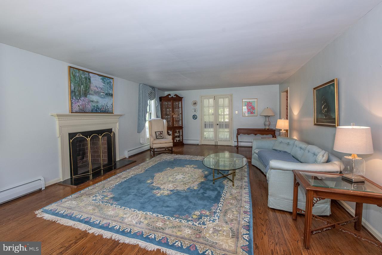 247 Church Road Devon, PA 19333 - Photo 5 of 35 a living room with furniture and a fireplace