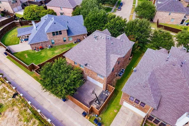 a spacious bathroom with a double vanity sink mirror and bathtub