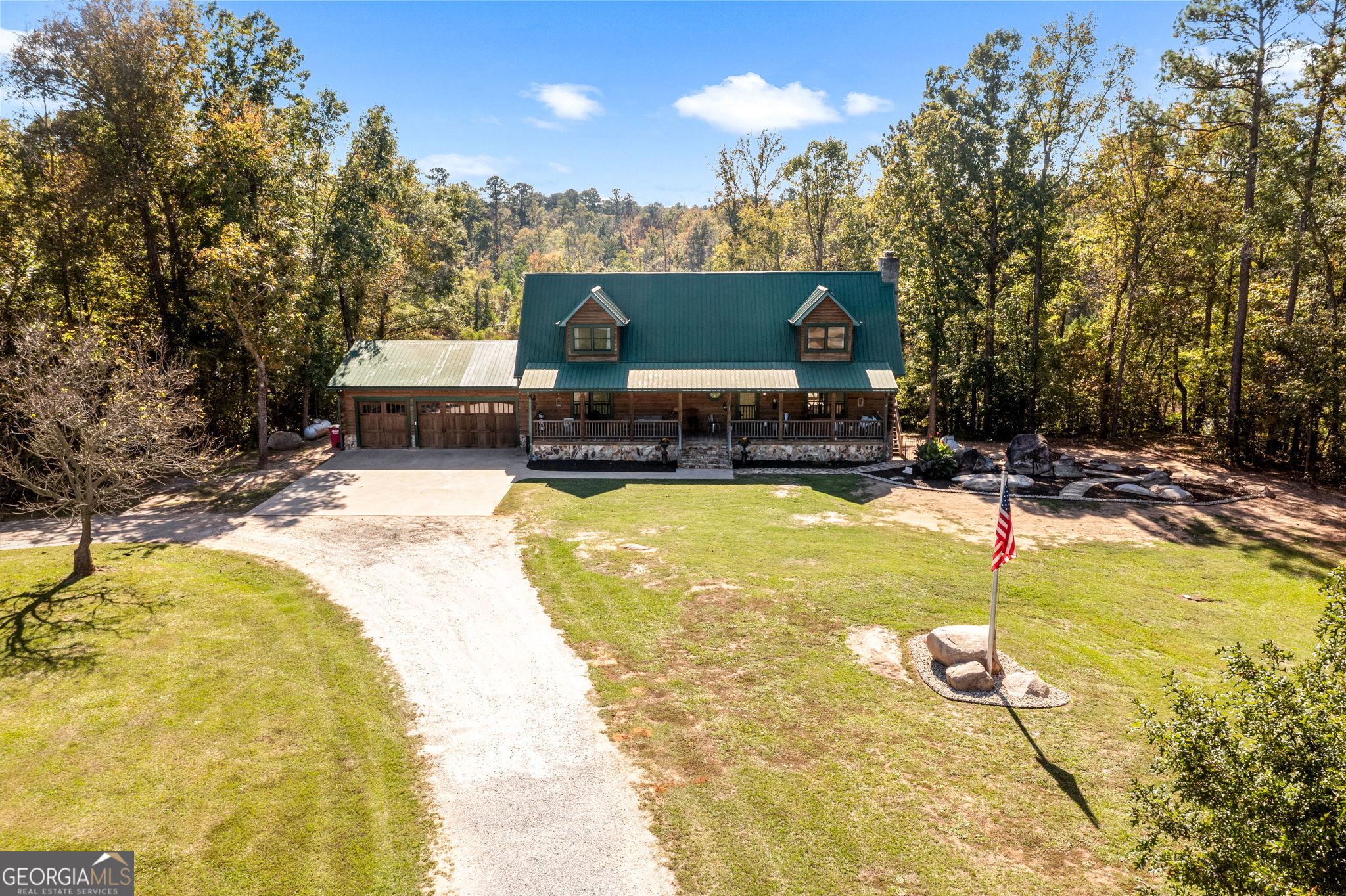a swimming pool with some trees in the background
