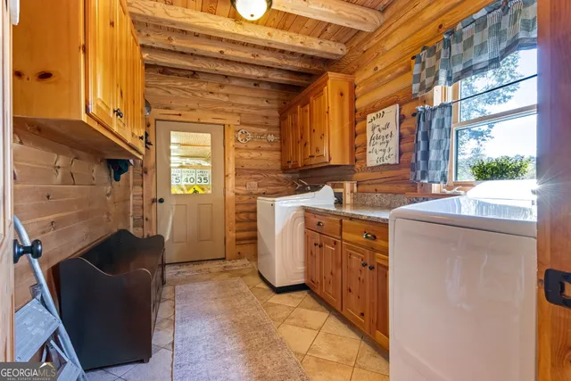 a view of a chairs and table in a room