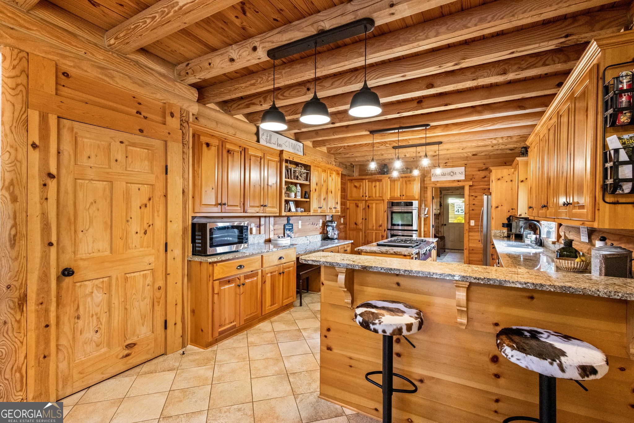 1382 Intermediate Road Harlem, GA 30814 - Photo 23 of 67 a kitchen with stainless steel appliances granite countertop a sink and cabinets