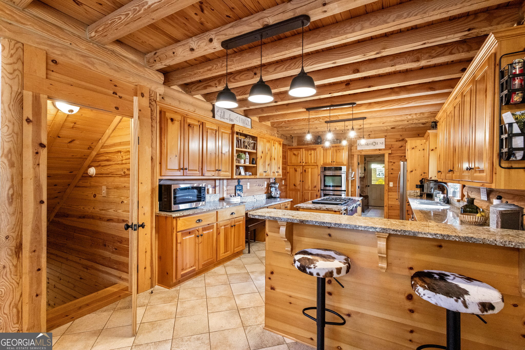 1382 Intermediate Road Harlem, GA 30814 - Photo 24 of 67 a kitchen with stainless steel appliances kitchen island granite countertop a sink and cabinets