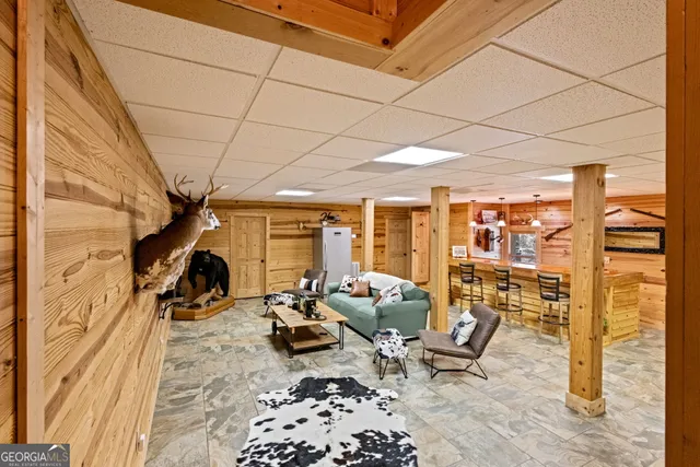 a bedroom with furniture and a fireplace