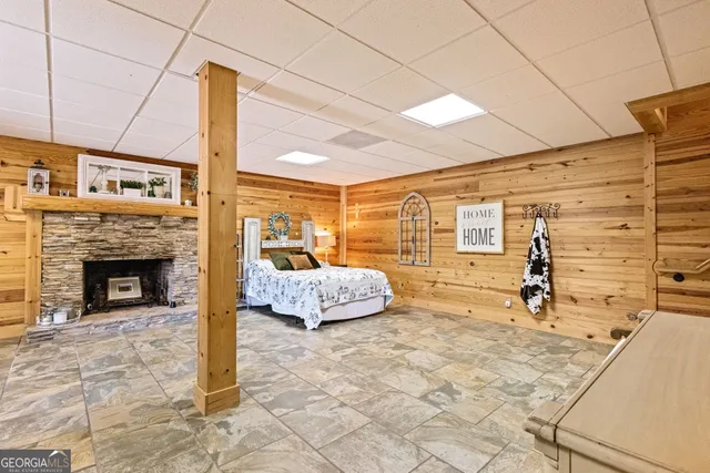a view of a patio with table and chairs and potted plants