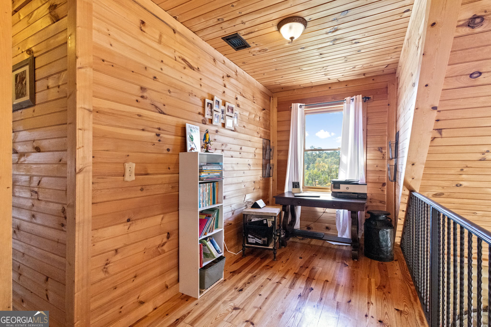 1382 Intermediate Road Harlem, GA 30814 - Photo 36 of 67 a view of balcony with wooden floor and seating space