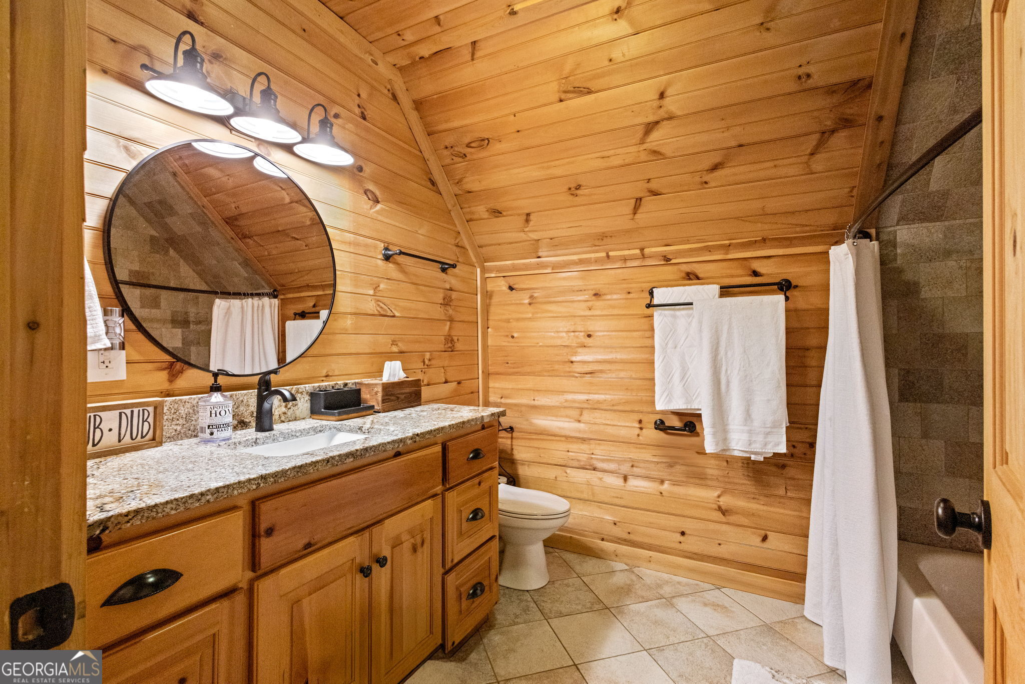 1382 Intermediate Road Harlem, GA 30814 - Photo 37 of 67 a bathroom with a granite countertop toilet sink and mirror