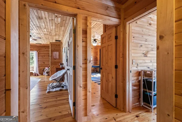 a view of a swimming pool with an outdoor space and seating area