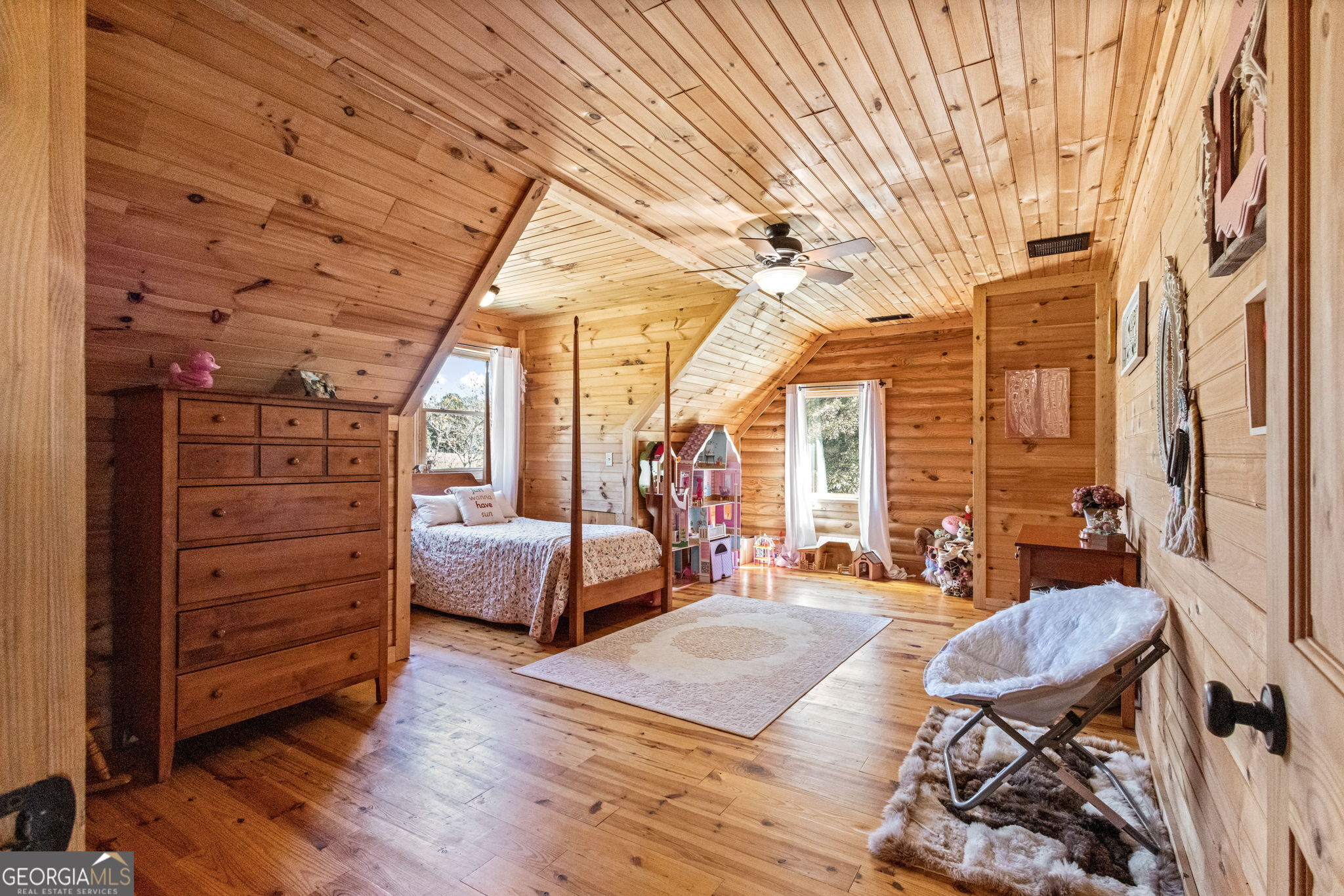 1382 Intermediate Road Harlem, GA 30814 - Photo 39 of 67 a bedroom with furniture and wooden floor