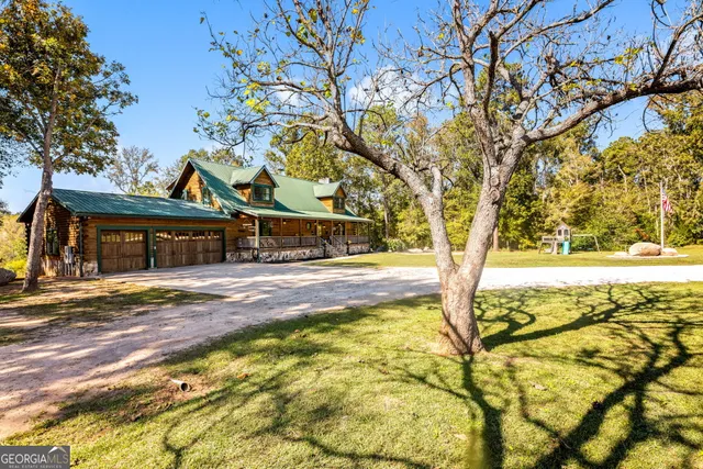 a front view of a house with a patio
