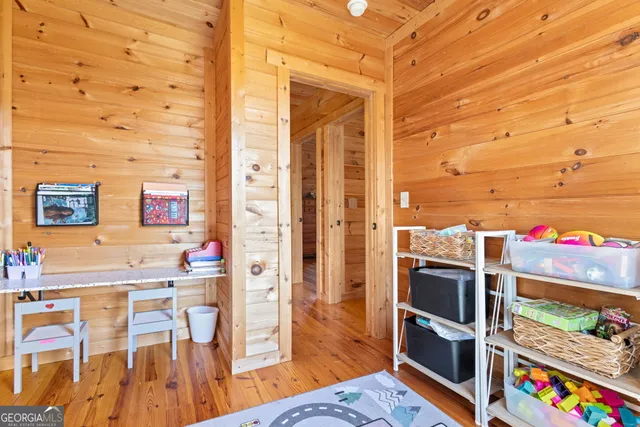 a room with lots of different colored cloths