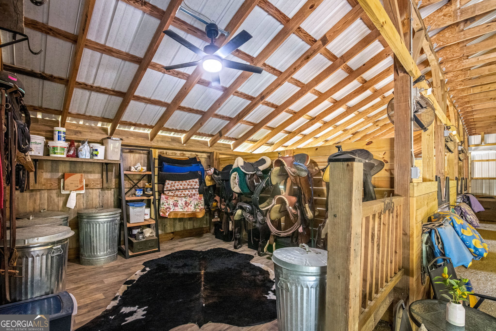 1382 Intermediate Road Harlem, GA 30814 - Photo 57 of 67 a room with lots of different colored cloths