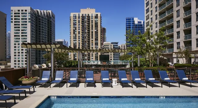a view of a building with sitting area
