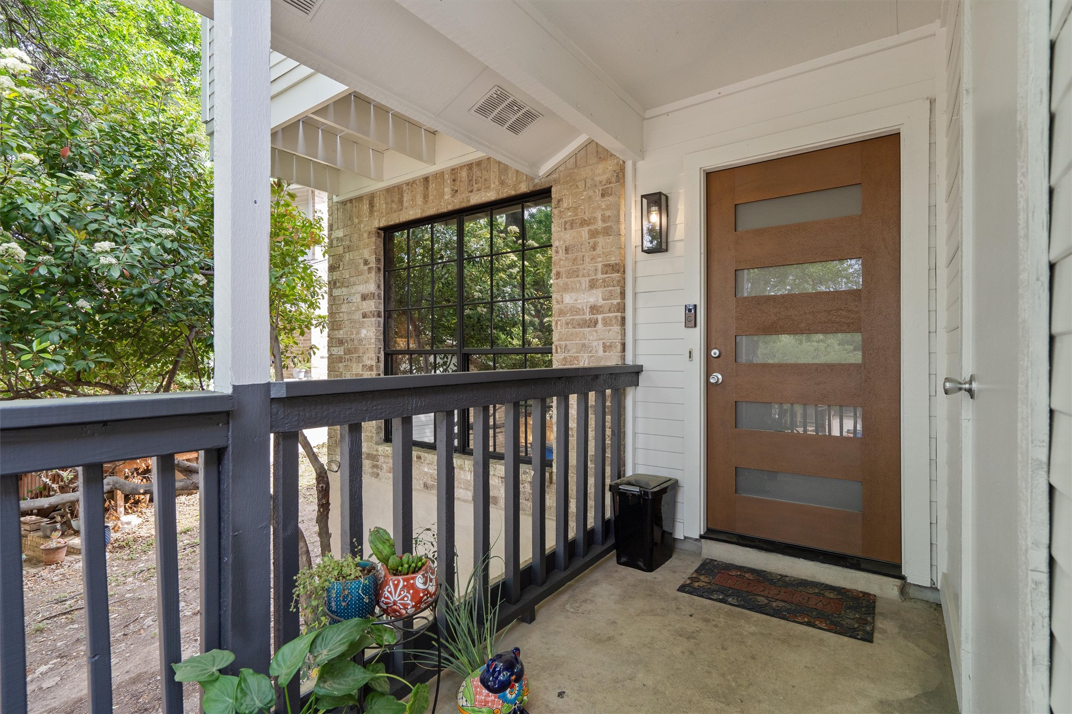 1707 Waterloo Trail Austin, TX 78704 - Photo 26 of 39 Doorway to property with brick siding