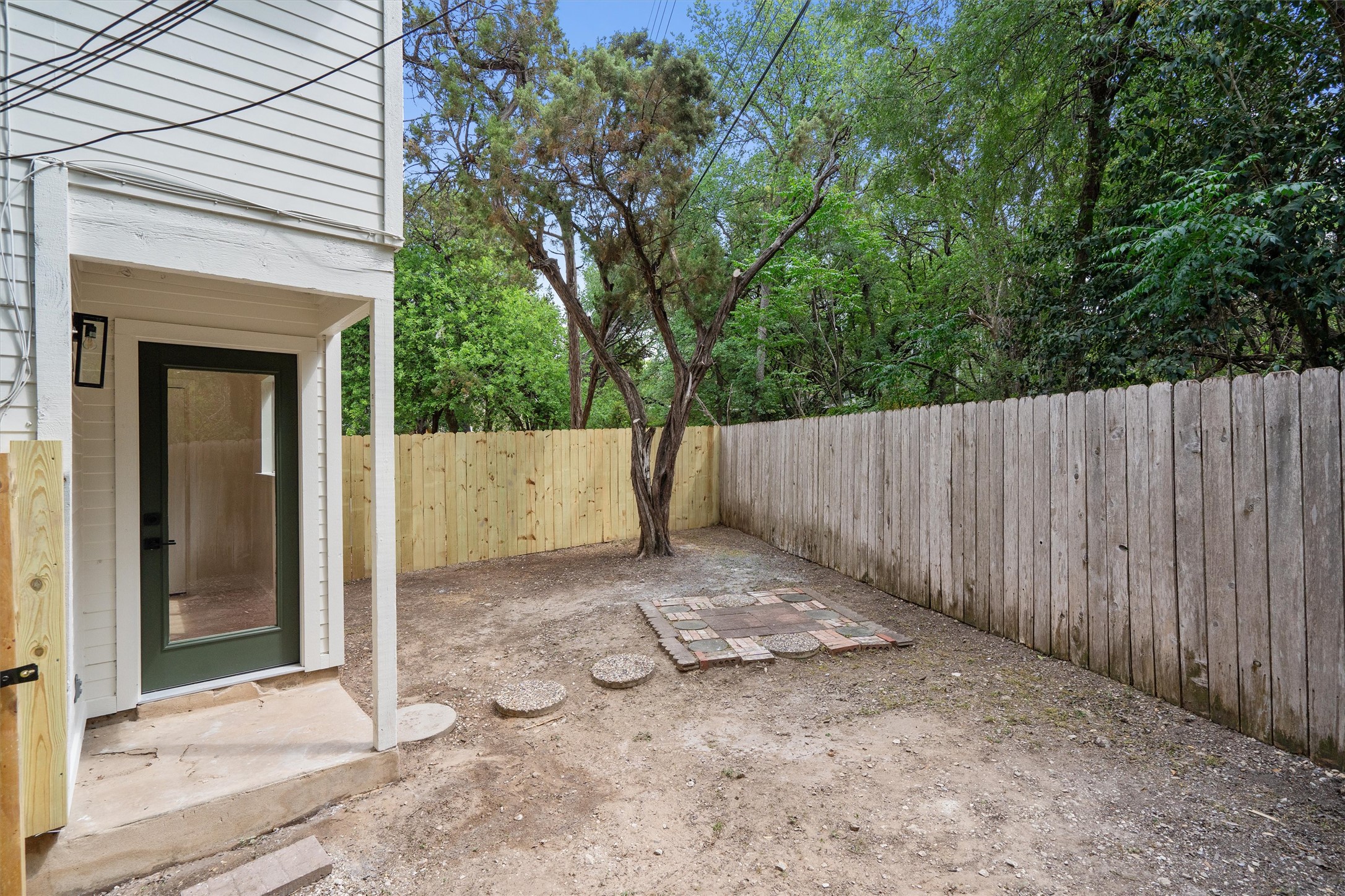 1707 Waterloo Trail Austin, TX 78704 - Photo 38 of 39 Fenced backyard featuring a patio