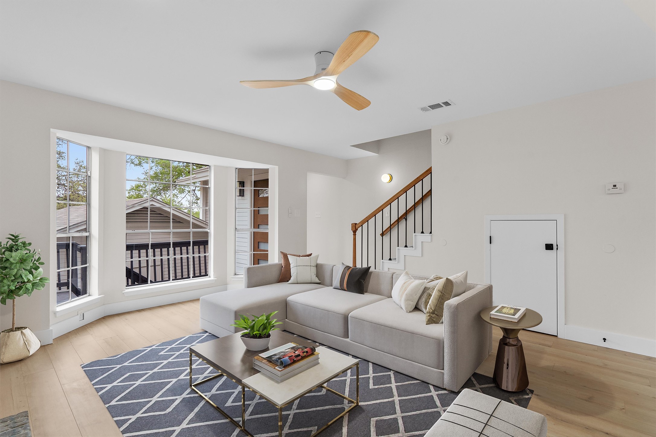 1707 Waterloo Trail Austin, TX 78704 - Photo 4 of 39 Living room featuring ceiling fan and light wood finished floors