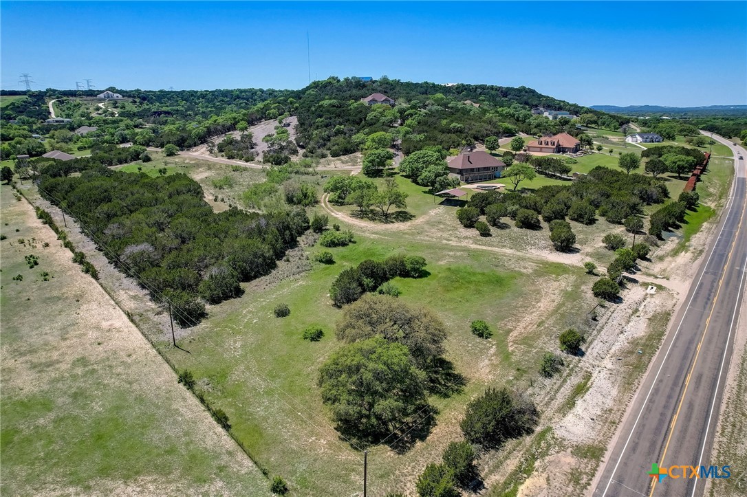 1214 Windy Hill Road Salado, TX 76571 - Photo 2 of 18 a view of a garden with a houses