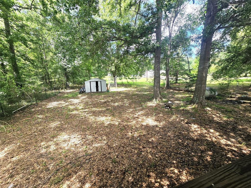 12910 Springhaven Drive Keithville, LA 71047 - Photo 25 of 33 Fenced in portion of the backyard