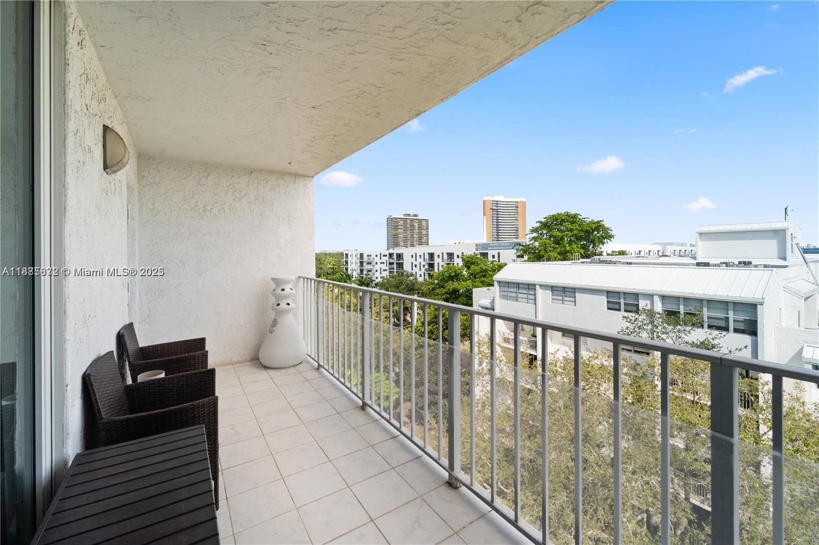 650 Northeast 64th Street, Unit GPH4 Miami, FL 33138 - Photo 15 of 24 a view of city from a balcony
