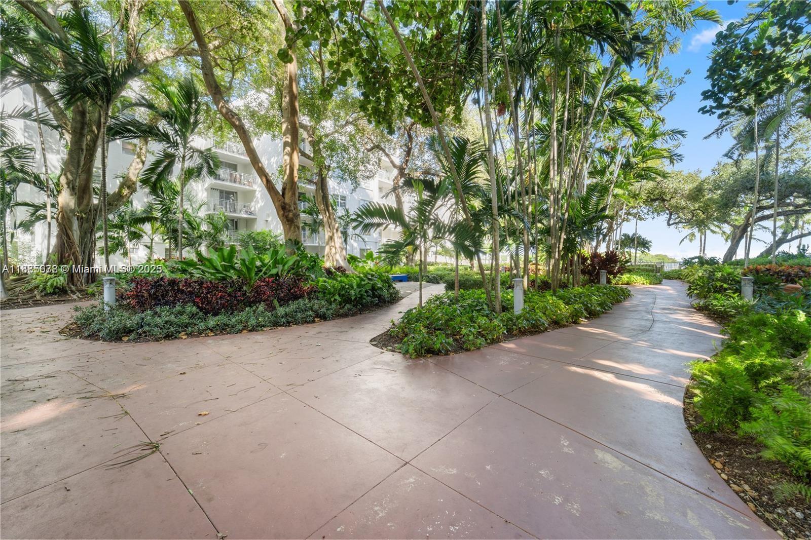 650 Northeast 64th Street, Unit GPH4 Miami, FL 33138 - Photo 17 of 24 a view of backyard with green space