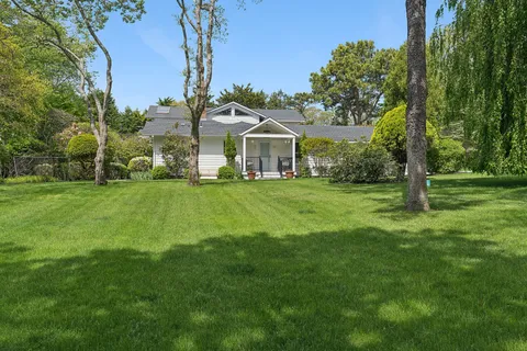 a view of a house with a big yard