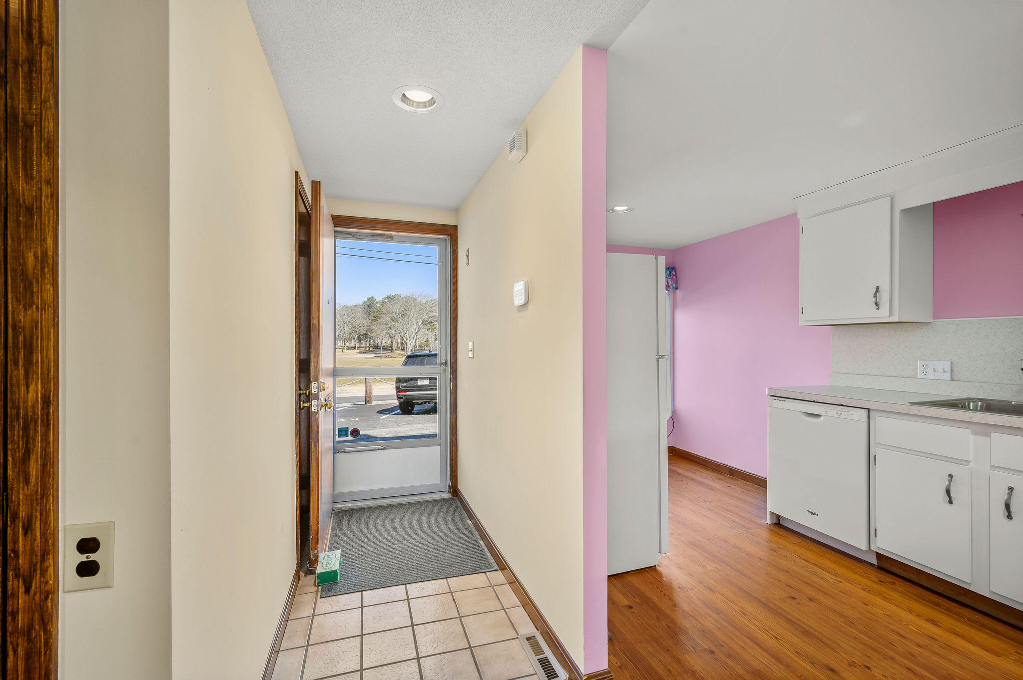 500 Ocean Street, Unit 153 Hyannis, MA 02601 - Photo 16 of 46 a kitchen with granite countertop a refrigerator and a sink