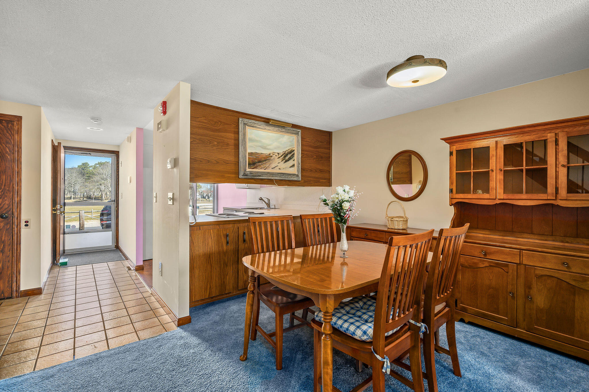 500 Ocean Street, Unit 153 Hyannis, MA 02601 - Photo 18 of 46 a view of a dining room with furniture and window