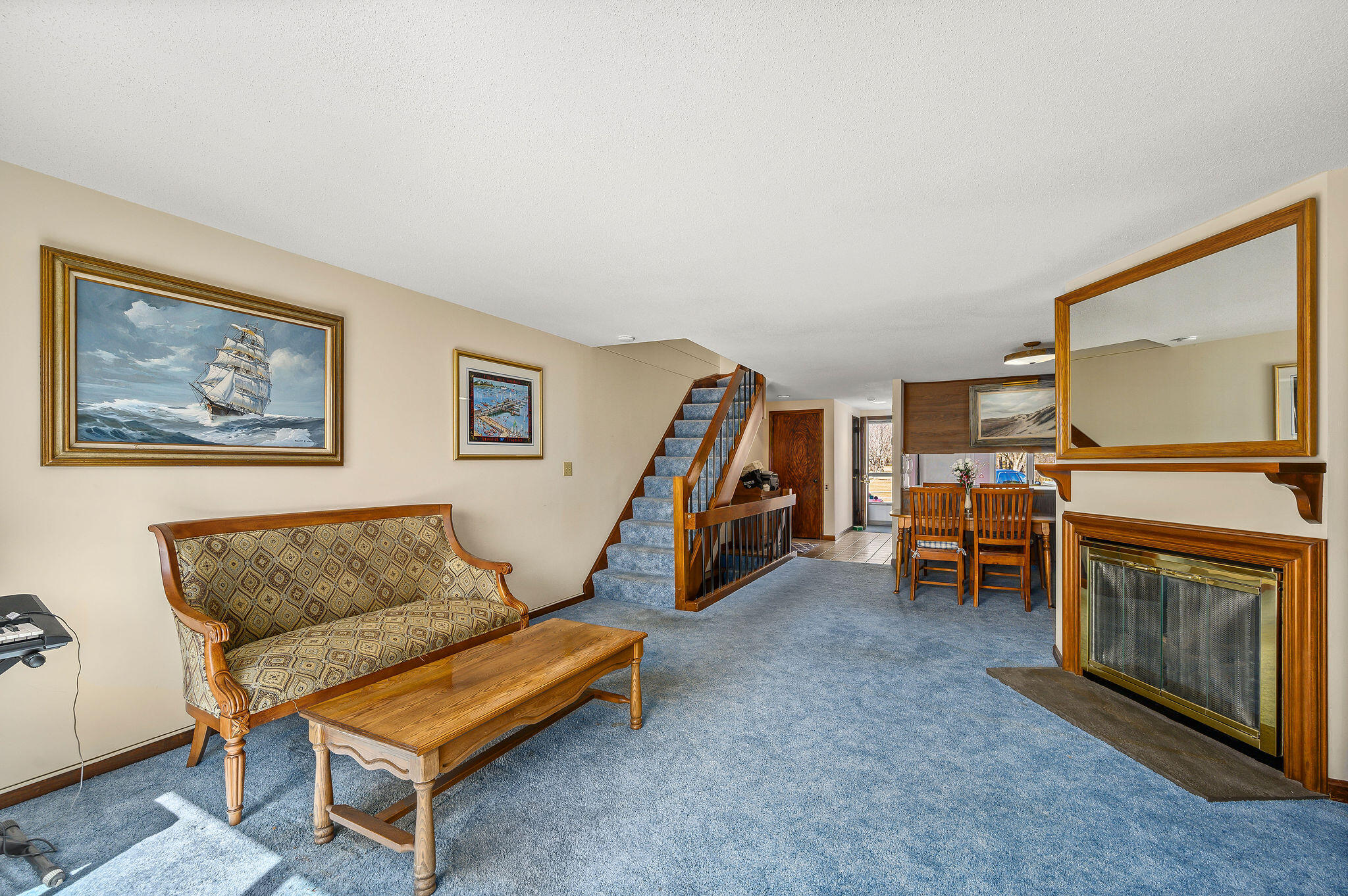 500 Ocean Street, Unit 153 Hyannis, MA 02601 - Photo 24 of 46 a living room with furniture a flat screen tv and a fireplace