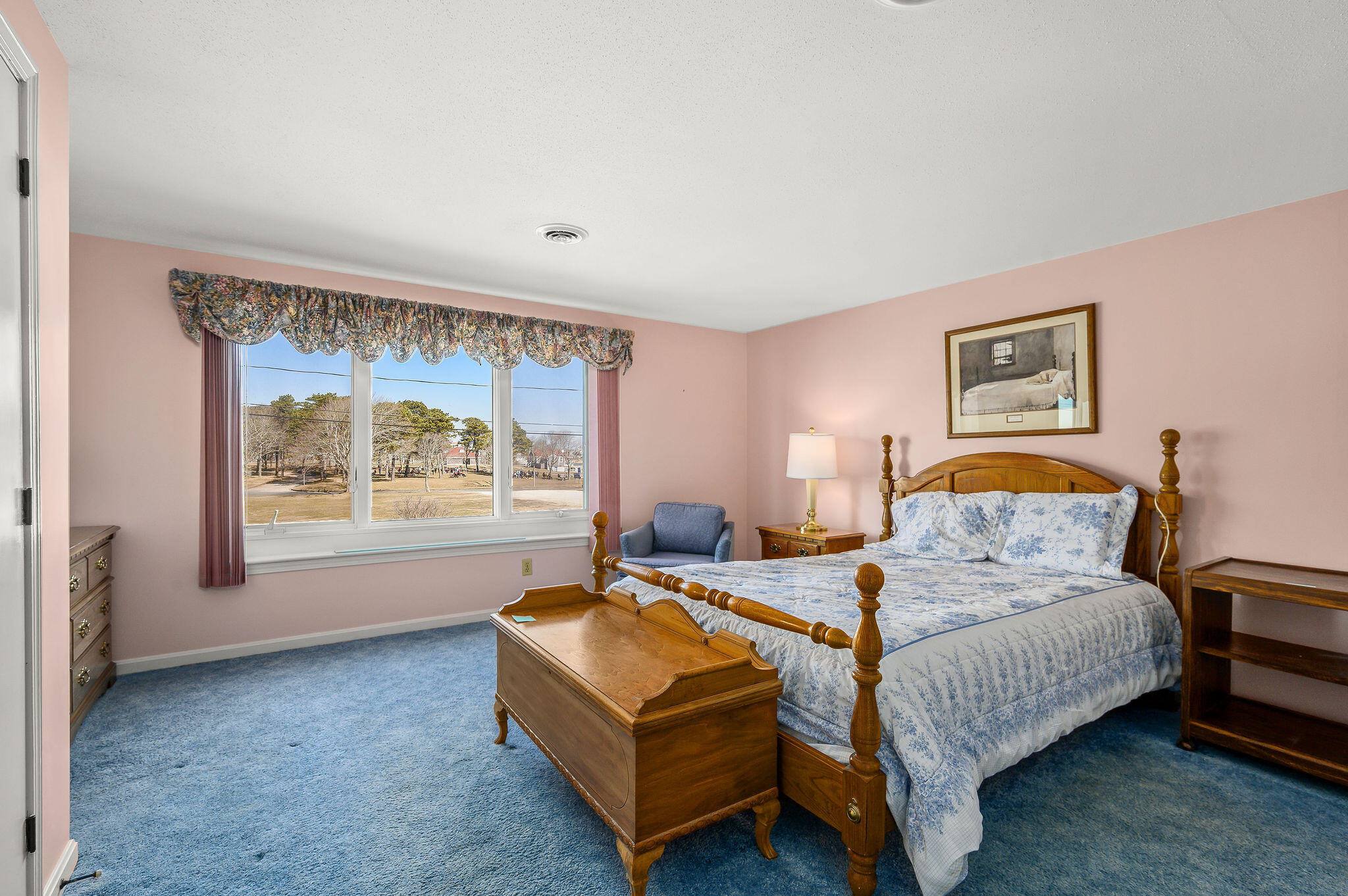 500 Ocean Street, Unit 153 Hyannis, MA 02601 - Photo 25 of 46 a bedroom with a bed and window