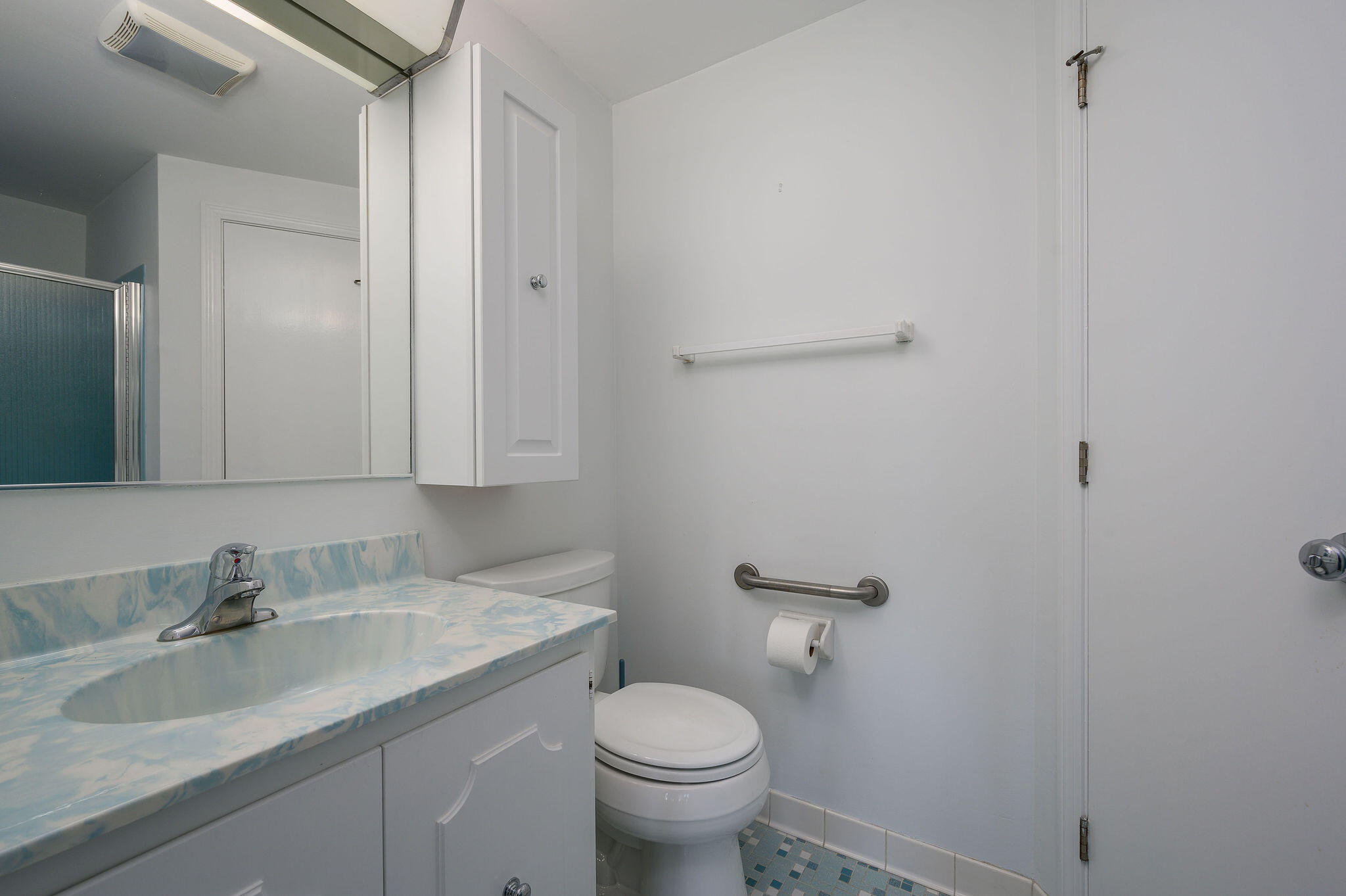 500 Ocean Street, Unit 153 Hyannis, MA 02601 - Photo 26 of 46 a bathroom with a sink toilet and a mirror