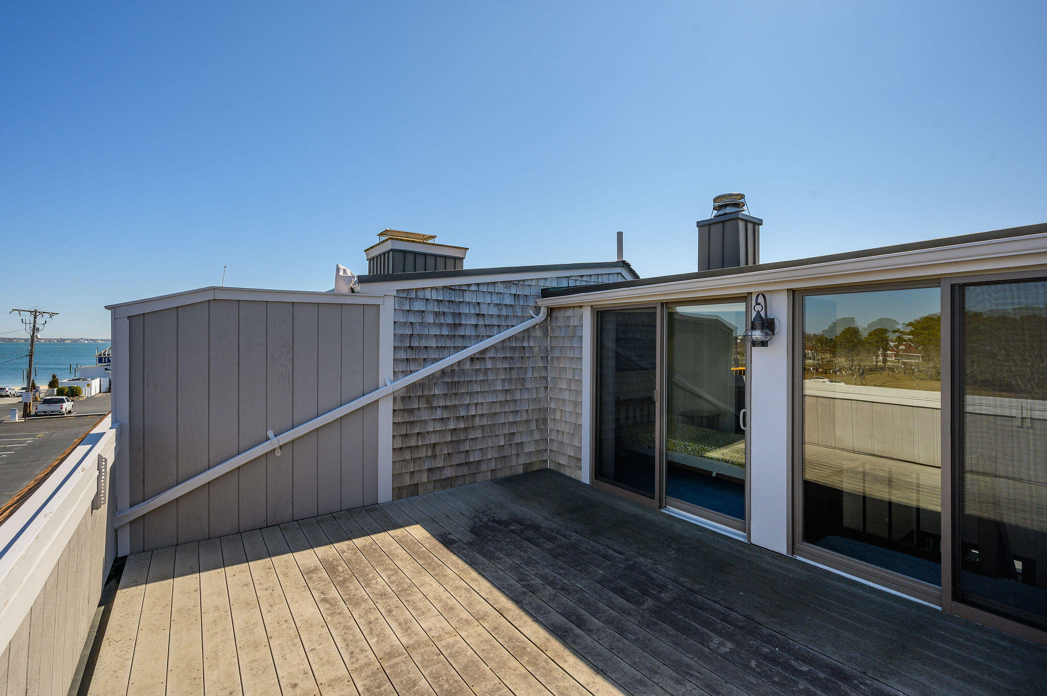 500 Ocean Street, Unit 153 Hyannis, MA 02601 - Photo 36 of 46 a view of a balcony with wooden floor