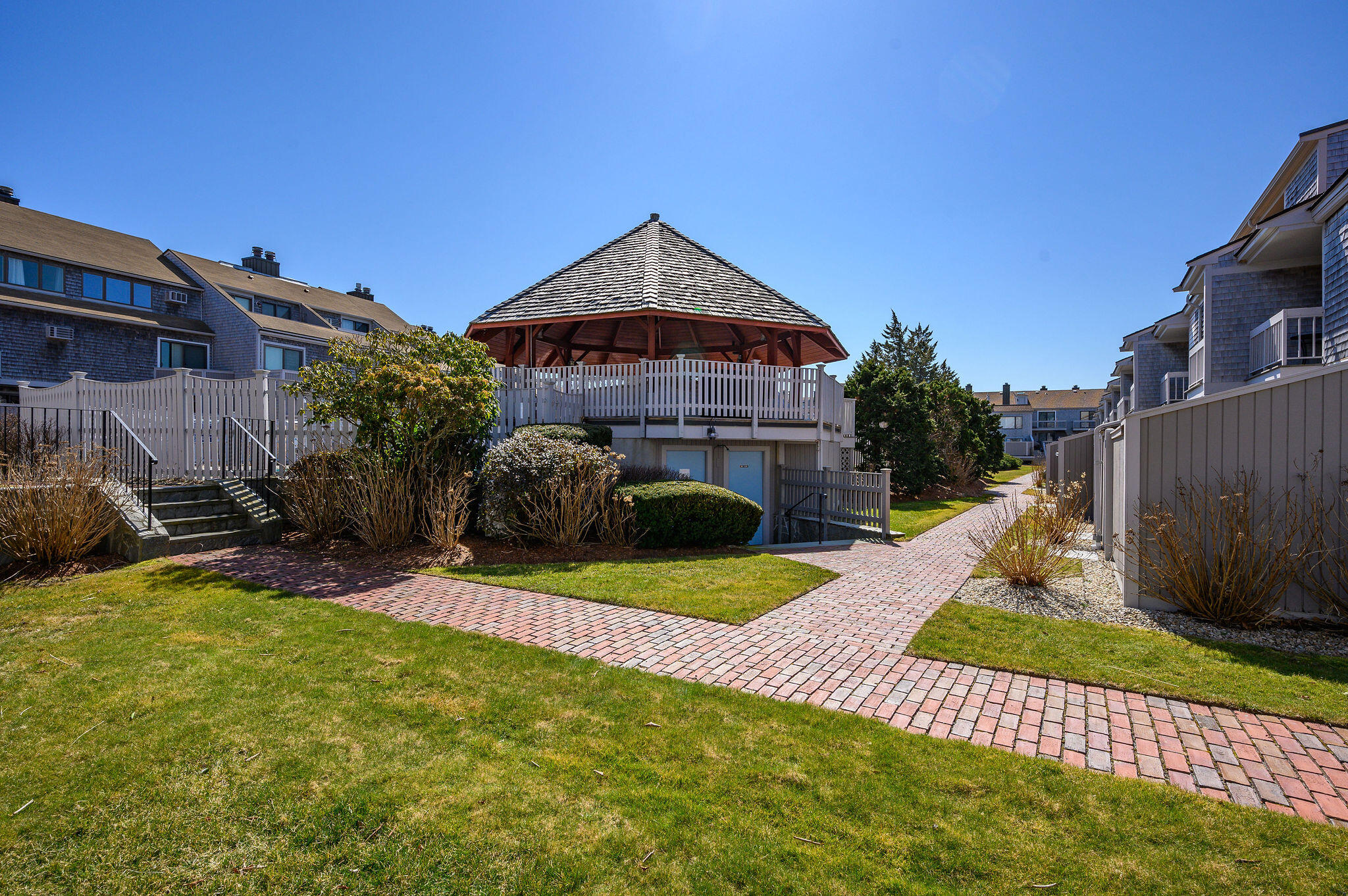 500 Ocean Street, Unit 153 Hyannis, MA 02601 - Photo 44 of 46 a view of a house with backyard and sitting area