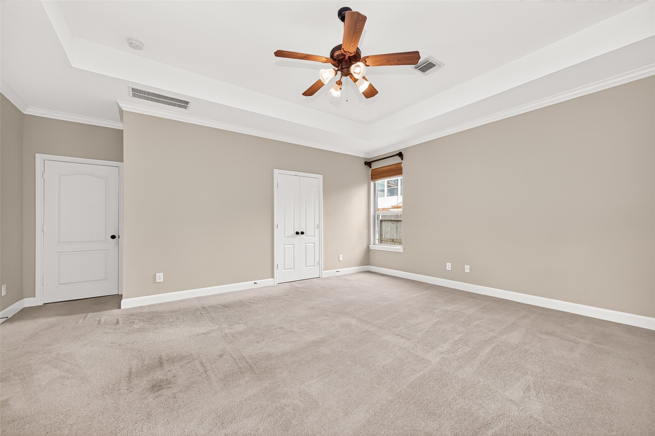 2310 Spring Lake Park Lane Spring, TX 77386 - Photo 38 of 47 a view of an empty room with a ceiling fan