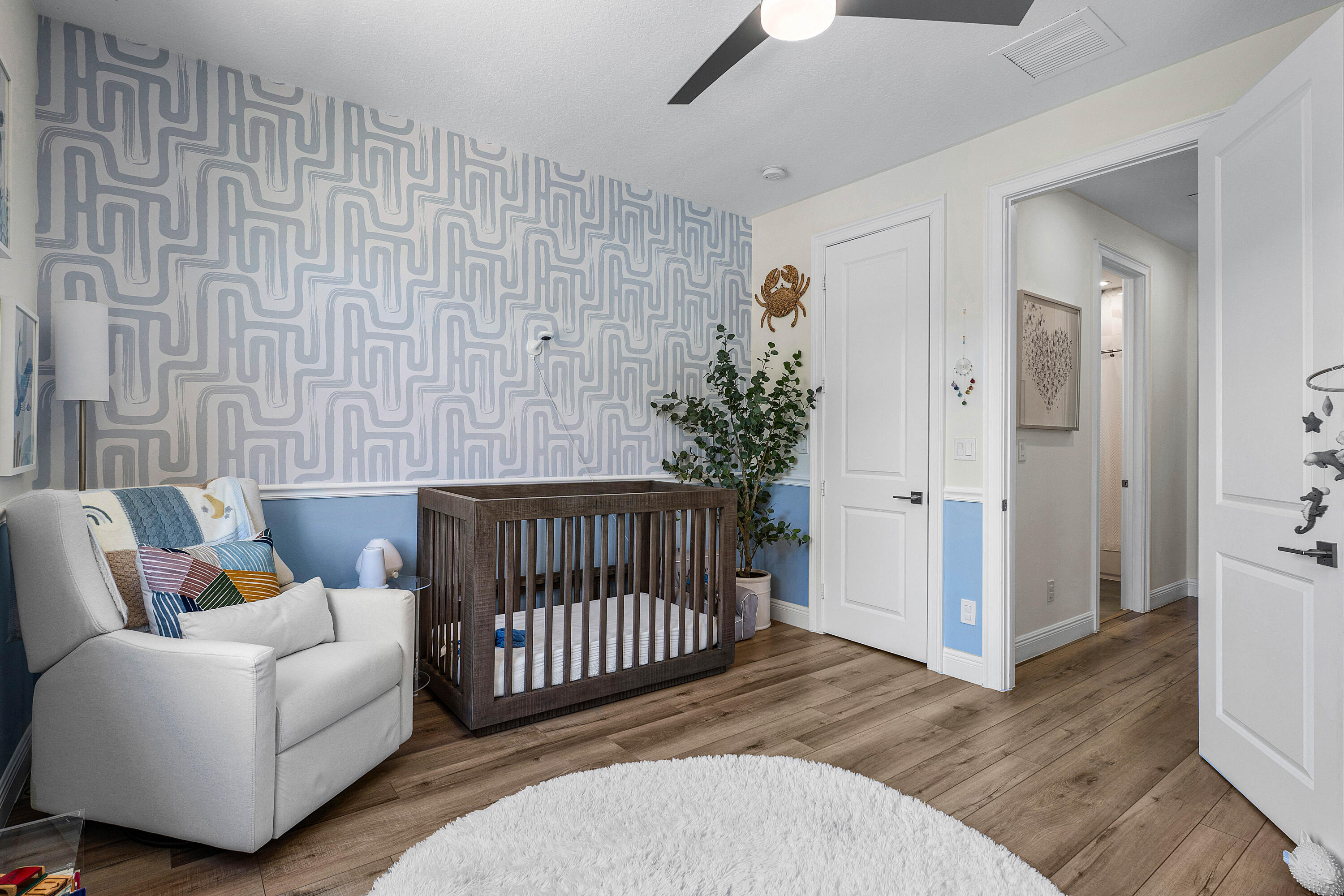 121 Via Poinciana Lane Boca Raton, FL 33487 - Photo 23 of 59 a bedroom with furniture and a window