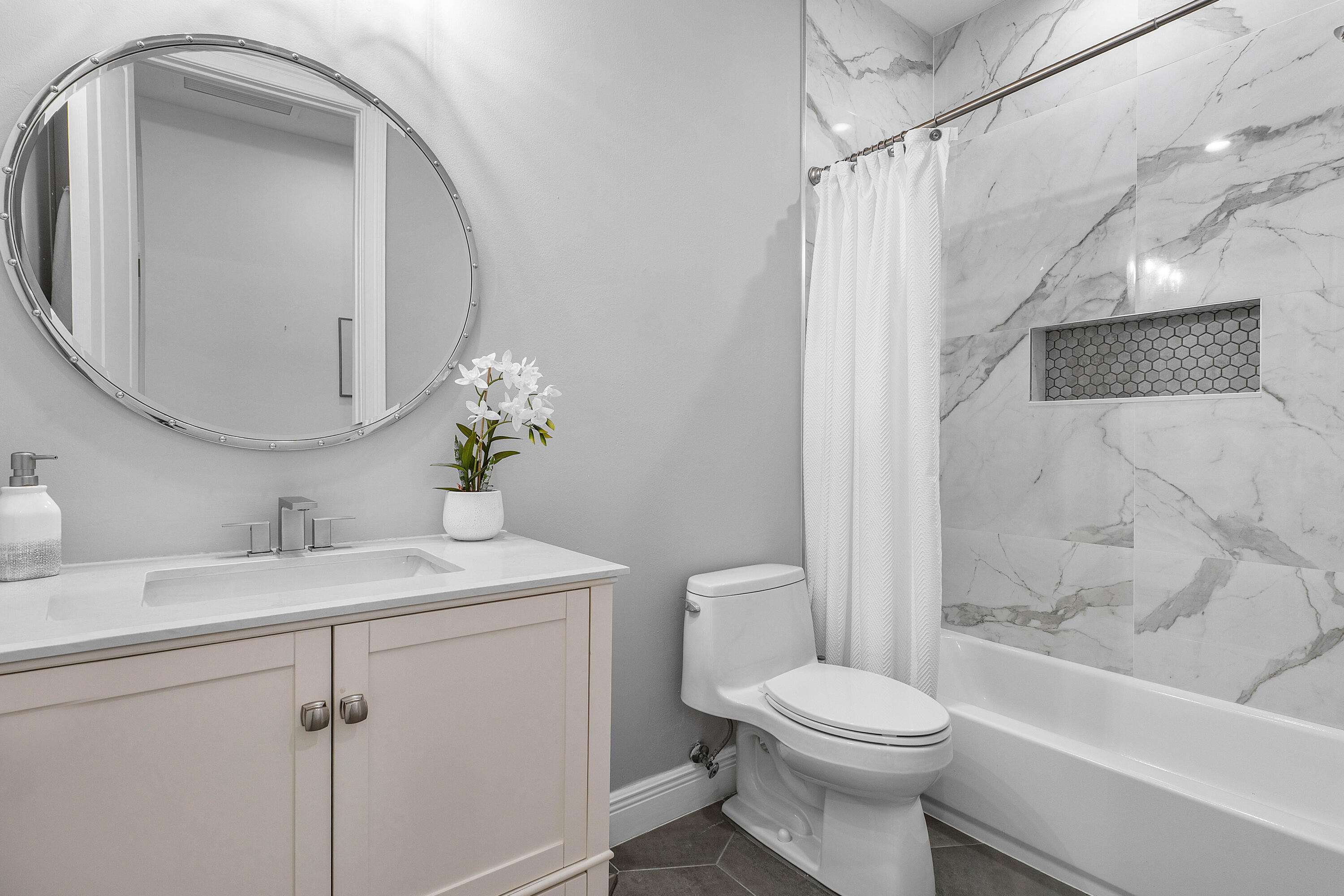 121 Via Poinciana Lane Boca Raton, FL 33487 - Photo 25 of 59 a bathroom with a sink toilet and shower