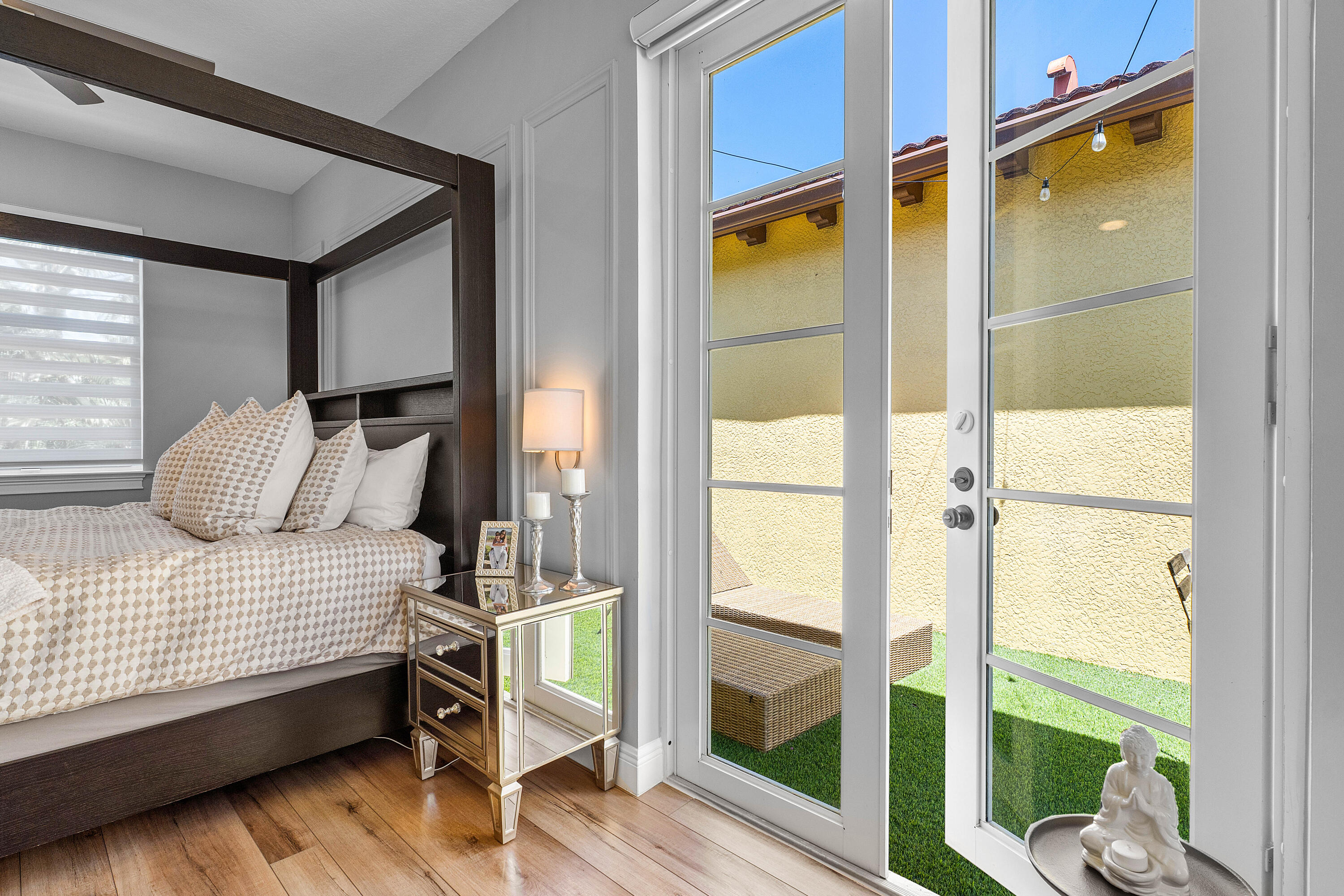 121 Via Poinciana Lane Boca Raton, FL 33487 - Photo 34 of 59 a bedroom with a bed and a window